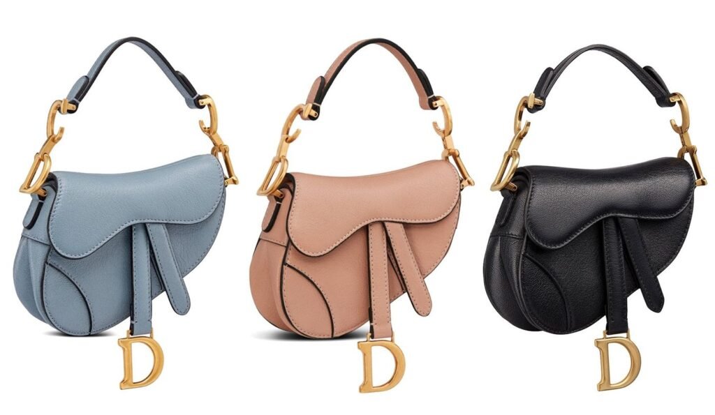 Dior Saddle bags in blue, pink, and black.